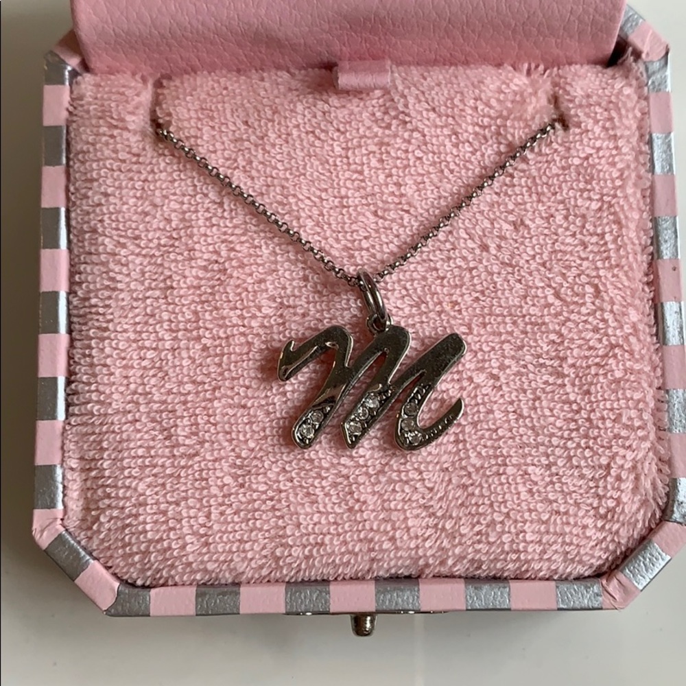 Letter M silver Juicy Couture necklace.